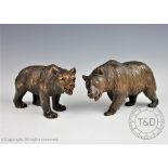 An early 20th century Black Forest bear, realistically carved and modelled standing,