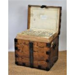 A Victorian golden oak and iron bound silver chest enclosing an assorted silver plated contents