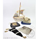 A hand painted and sewn model boat 'HMS Victory', possibly a large pin cushion, 37cm high,