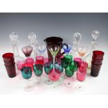 A selection of glassware to include, cranberry glass drinking glasses, wine glasses,