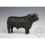 A Shebeg Welsh black bull, modelled free standing,