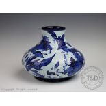 A Moorcroft Serotina midnight blue and peony vase, designed by Philip Gibson, circa 1999,
