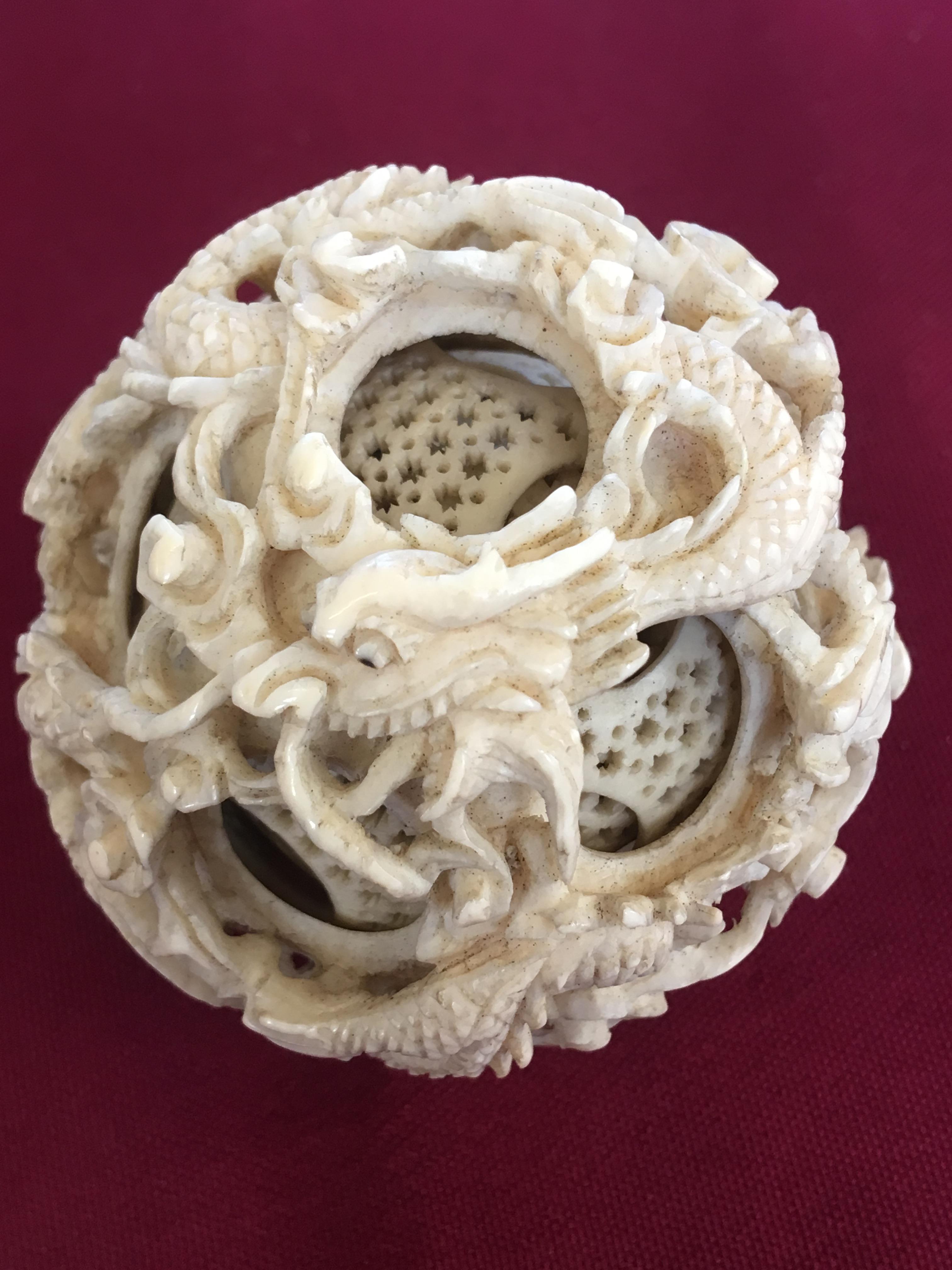 A late 19th century Chinese Canton carved ivory puzzle ball and stand, - Image 4 of 11