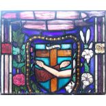 Three late 19th century Arts and Crafts style stained glass panels,