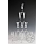A Edinburgh Crystal glass suite of thirteen champagne flutes,