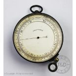 A circular Altimeter & Barometer, with adjustable bezel and magnifying glass. 7.