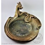 An unusual and large stoneware dragon dish,