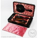 A Victorian leather cased vanity set,