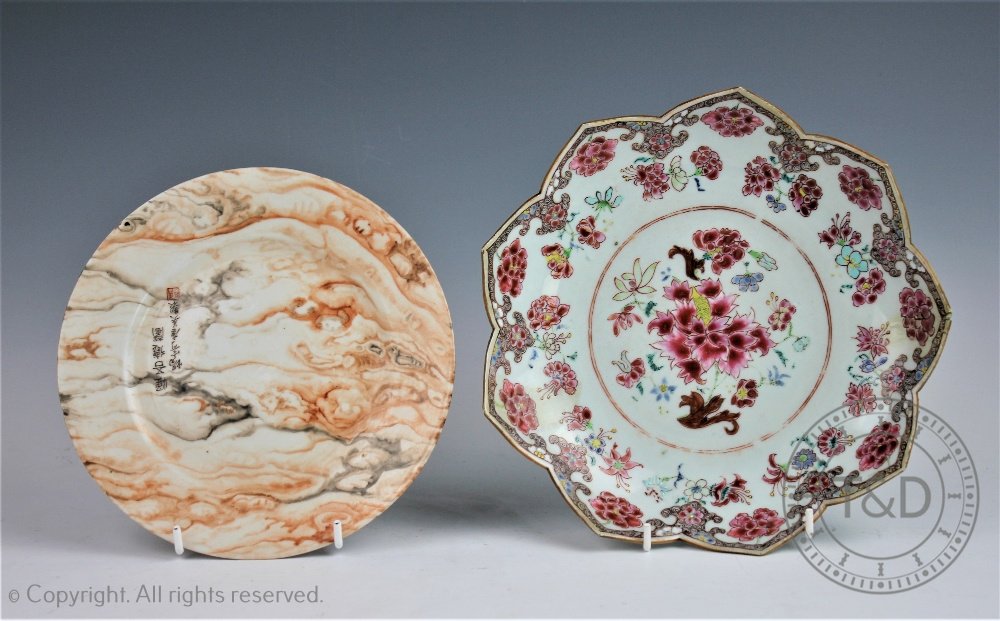 A Chinese porcelain 18th century lotus plate, the moulded plated with extensive floral decoration,