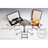 A selection of silver to include a Victorian cased christening set enclosing a knife,