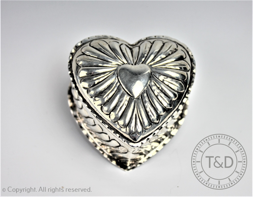 A Victorian silver heart shaped box and cover, George Heath, London 1886,