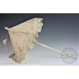 A late Victorian carved ivory and lace parasol, with original ivory loop,