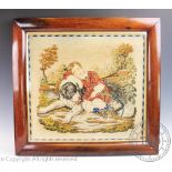 A Victorian needlepoint embroidery, depicting a young boy and his dog,