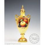 A Coalport fruit decorated vase and cover,