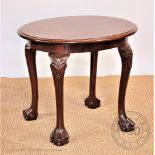 A modern Queen Anne style mahogany oval table, with cabriole legs and claw and ball feet,
