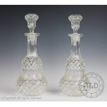 A pair of early 20th century thistle shaped decanters and stoppers,