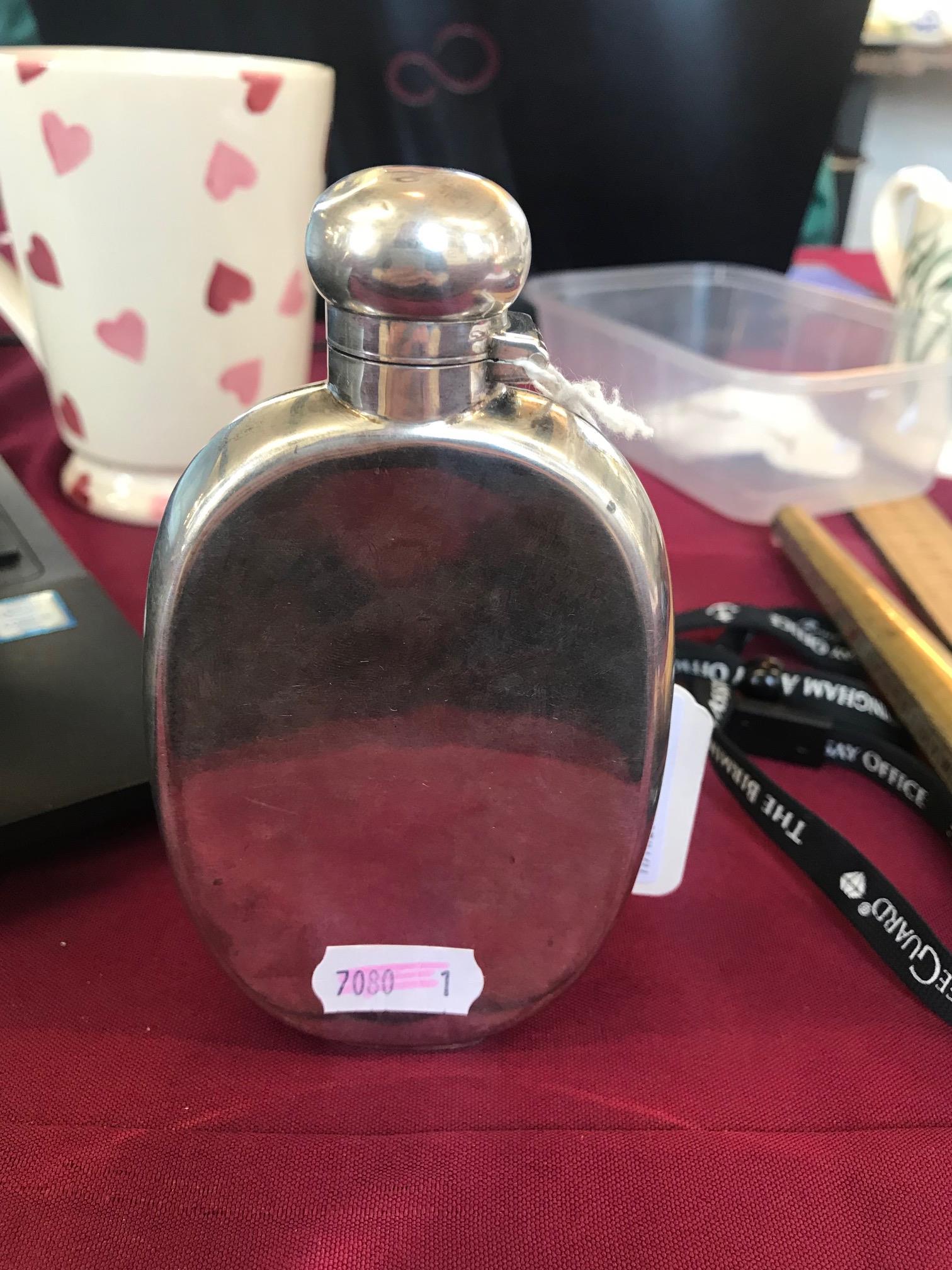 A silver hip flask, 'J M & S' Sheffield 1911, of oval form with concave back and bayonet top, - Image 6 of 7