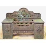A 19th century cast iron fire grate and back,