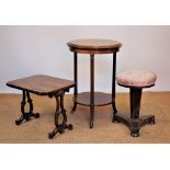 A Victorian mahogany two tier circular occasional table, with reeded legs,