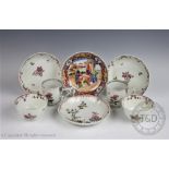 A pair of New Hall porcelain tea bowls and saucers, circa 1800,