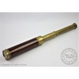 A 19th century mahogany and lacquered brass three draw telescope, engraved 'J.
