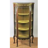 A French Louis XVI style gilt metal mounted and stained wood bow front vitrine, with four shelves,
