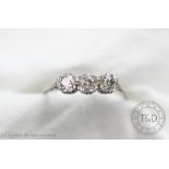 A three stone diamond ring,