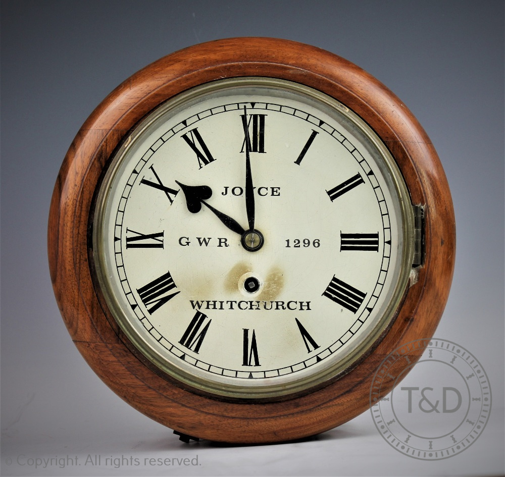 A fusee station type clock, with 20cm Roman numeral dial bearing 'Joyce GWR 1296 Whitchurch',