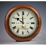 A fusee station type clock, with 20cm Roman numeral dial bearing 'Joyce GWR 1296 Whitchurch',