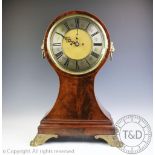 An unusually large late 19th century twin fusee mahogany balloon clock,