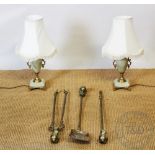 A Victorian style brass three piece companion set, with claw and ball terminals, poker 89cm,