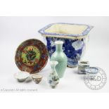 A collection of Chinese porcelain to include a 19th century clobbered plate, 21cm diameter,