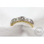 A diamond set half eternity ring,