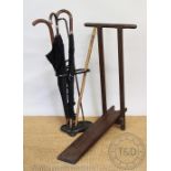 A Coalbrookdale style cast iron stock stand, 55cm H,