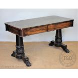 A William IV carved rosewood library table,