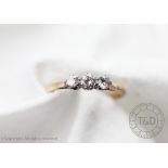 A three stone diamond ring,