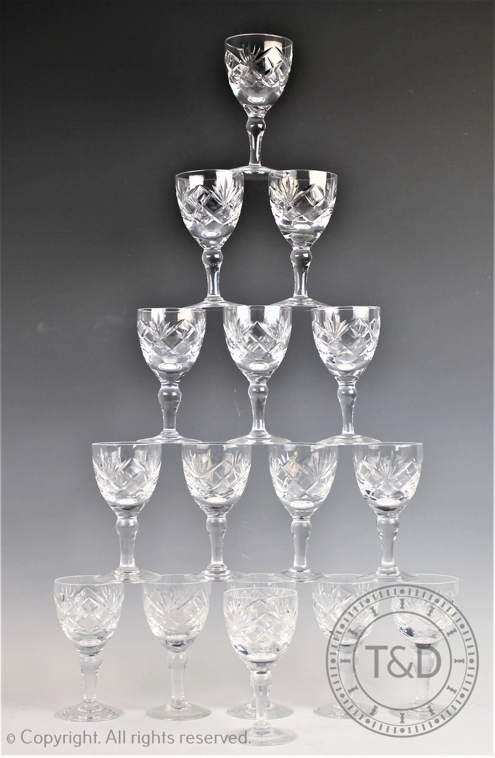 A selection of drinking glasses to include a set of sixteen Royal Brierley wine glasses, 13.