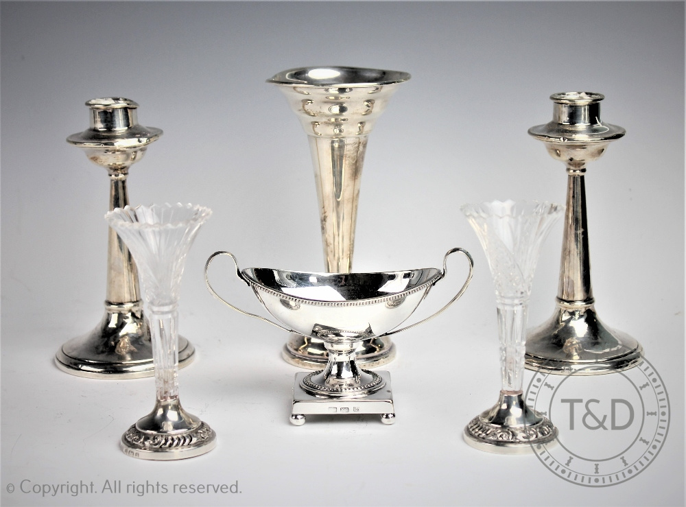 A selection of silver comprising, a pair of alter style candle sticks, Sydney & Co, Birmingham 1827,