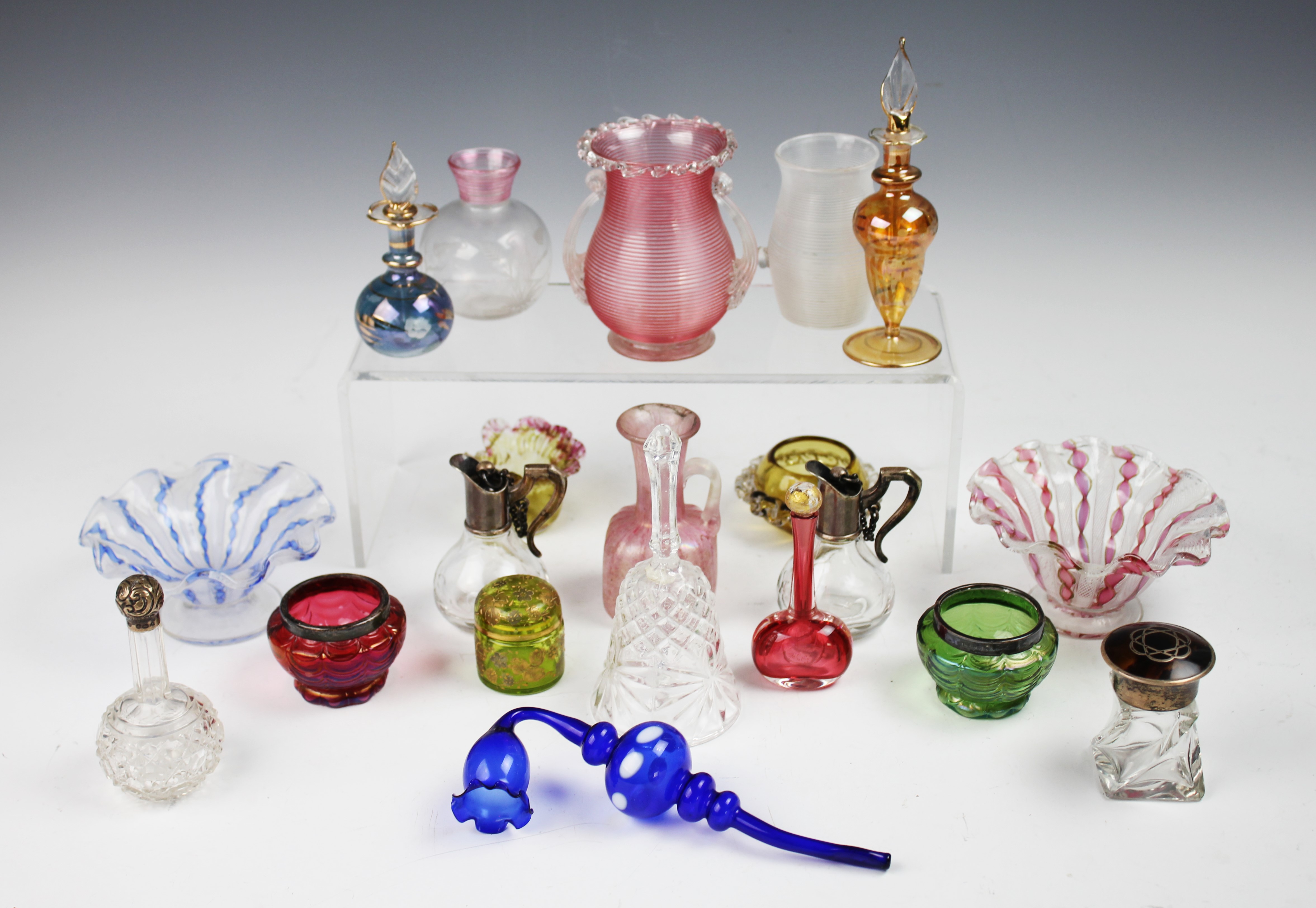 A selection of glassware to include two Venetian latticino glass pedestal bon bon dishes,