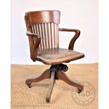 An Edwardian oak vintage swivel desk chair / estate chair, with leatherette seat,