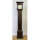 An 18th century style eight day oak Quaker type clock, with Roman numeral chapter ring,
