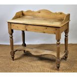 A Victorian style pine two tier wash stand, on turned legs,