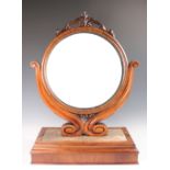 A Victorian carved walnut dressing table mirror,