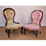 Two Victorian walnut salon chairs, on cabriole legs,