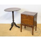 An Edwardian inlaid mahogany cellarette, of rectangular form, on tapered legs,