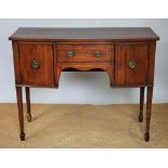 A Regency style mahogany bow front side board, with drawer and two cupboard doors, on tapered legs,