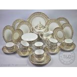 A Victorian Staffordshire gilt decorated tea service, comprising; eight teacups and seven saucers,