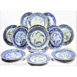 A set of fifteen Japanese Arita porcelain plates, 19th century, each of circular scalloped form,