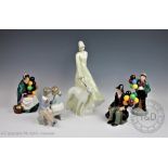 Four Royal Doulton Figures, Strolling HN3073, signed in gold, Old Balloon Seller HN1315,