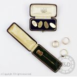 A pair of 9ct yellow gold cufflinks, weight 8.1gms, a 9ct gold band with engraved detail 5.